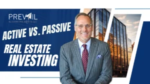 Man in suit smiling in front of modern office buildings with text reading “Active vs. Passive Real Estate Investing” and Prevail Alternative Assets logo.