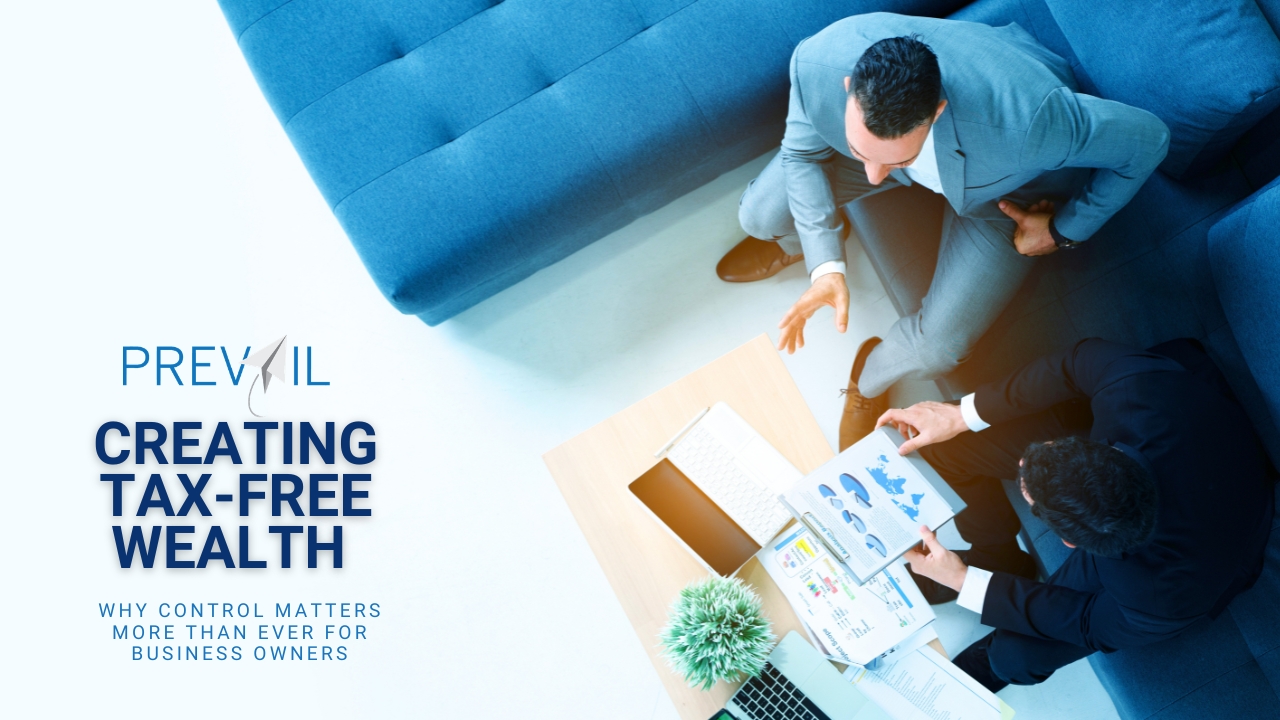 Prevail advisors and business owner reviewing strategic charts focused on creating tax-free wealth and maximizing capital control.